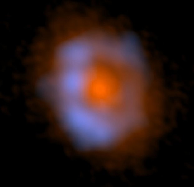 <p>Protohvězda V883 Orionis - oranžově jsou označené částice prachu, modře pak organický metanol.</p>