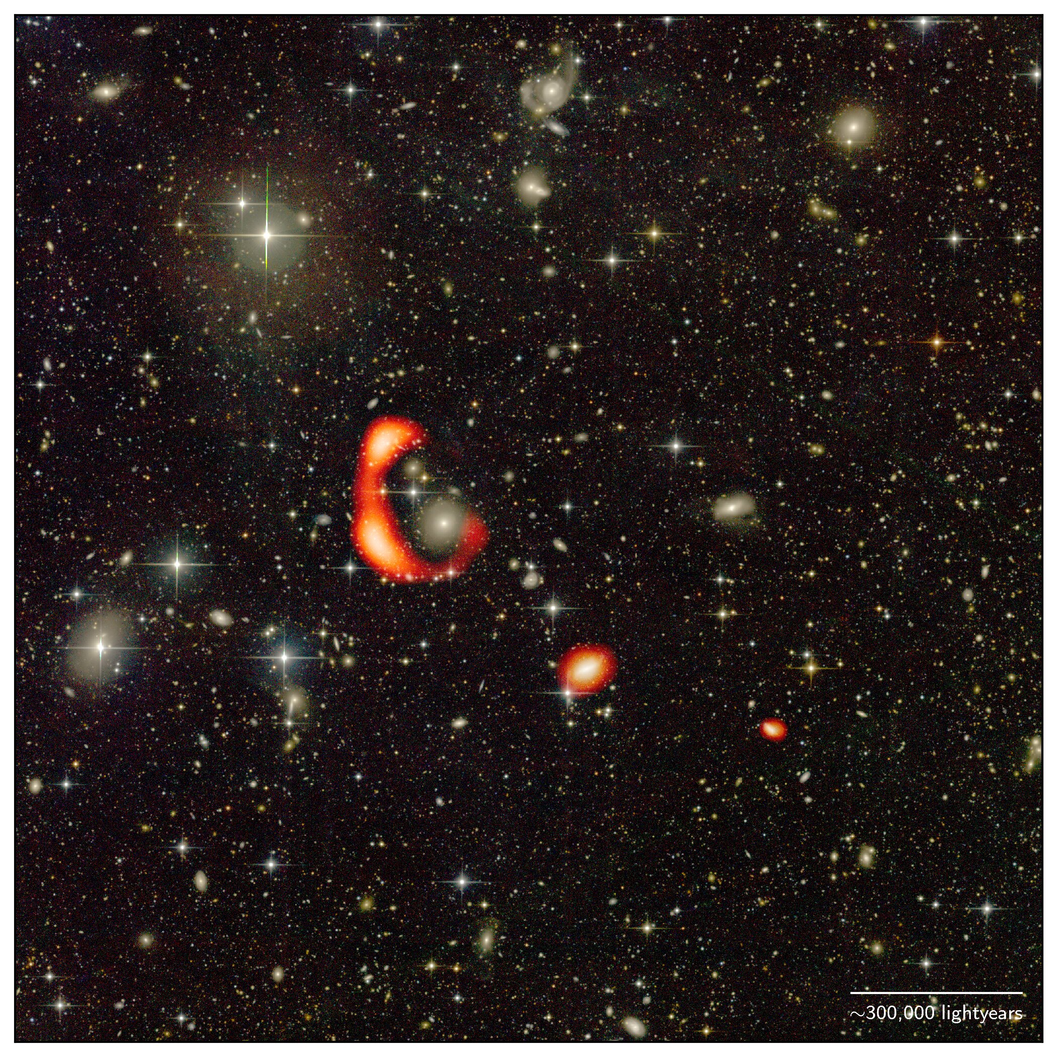 <p>Oblaka neutrálního vodíku u galaxie AGC 203001 jsou vyznačené červenou barvou.</p>
