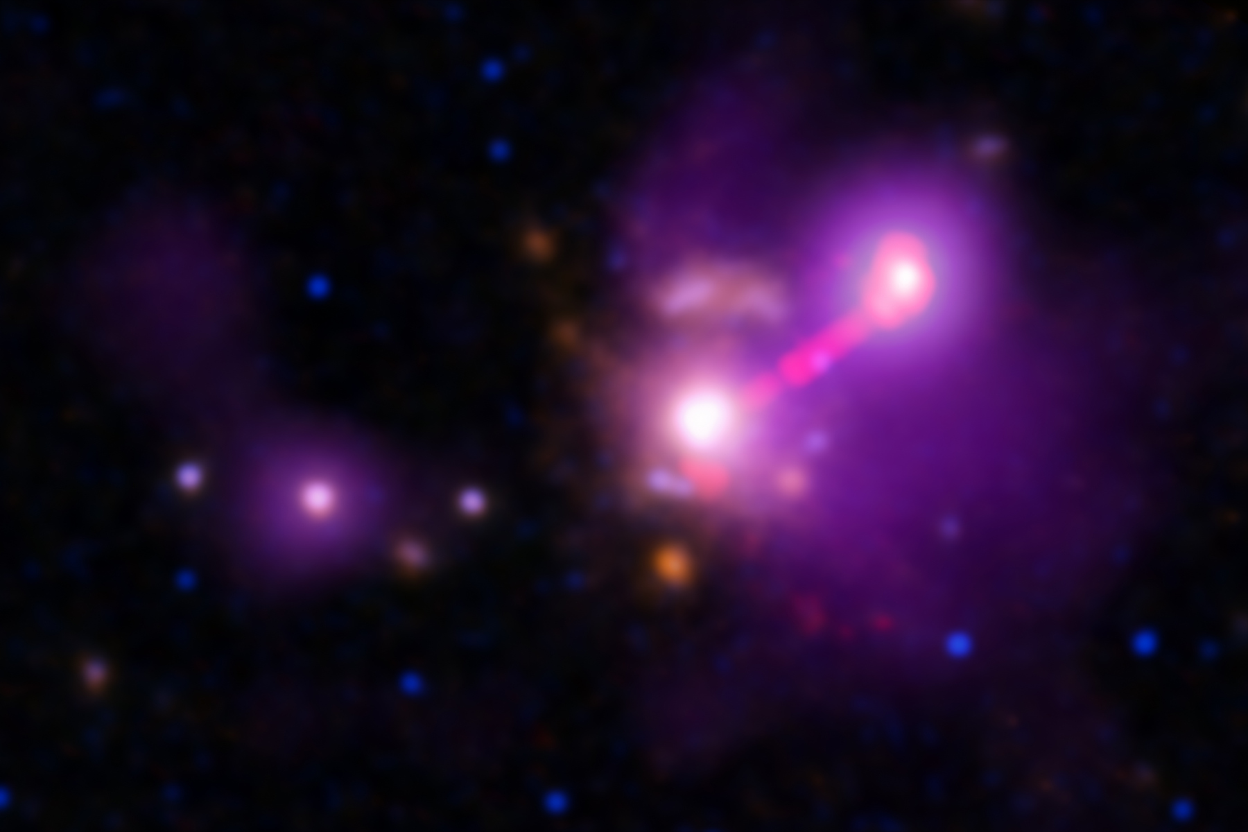 <p>Kompozitní snímek galaxie 3C 297 pořízený rentgenovou observatoří Chandra a mezinárodní observatoří Gemini.<em> (foto: NASA/CXC/ESA, Univ. of Torino, V. Missaglia, CC BY-SA 4.0)</em></p>